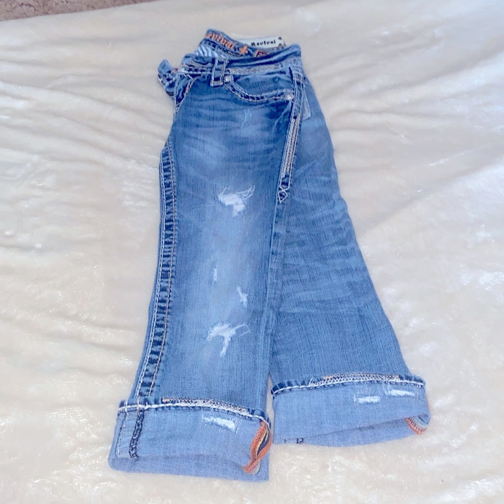 Rock Revival Capri, 25, distressed. SOLD